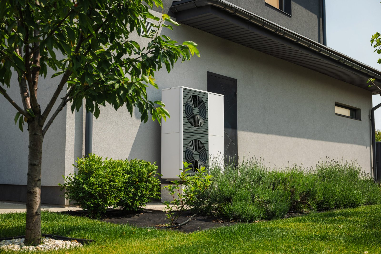 Air source heat pump outside a home